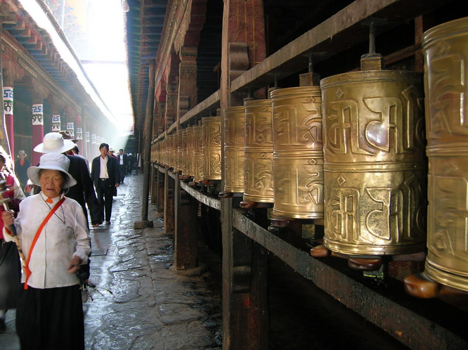 Prayer wheels inside the Jokhang temple. Lhasa, Tibet.